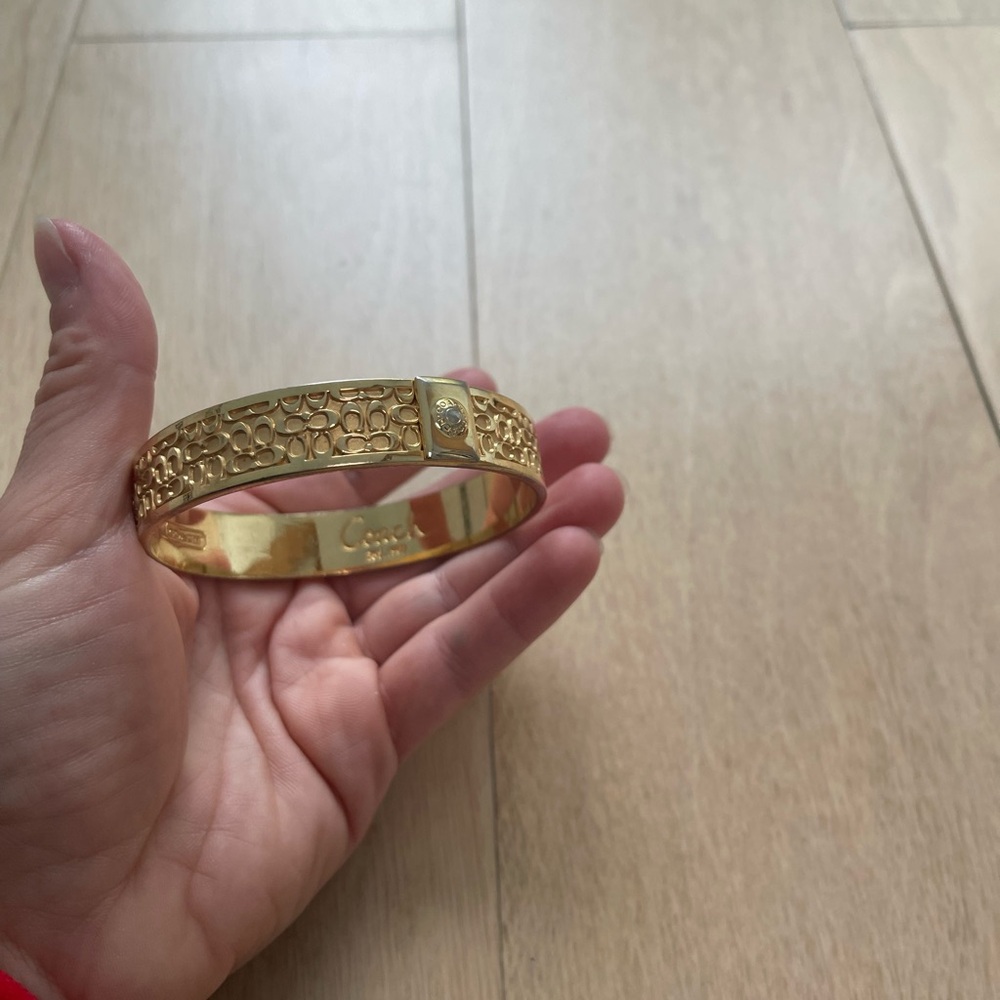 Coach gold bangle